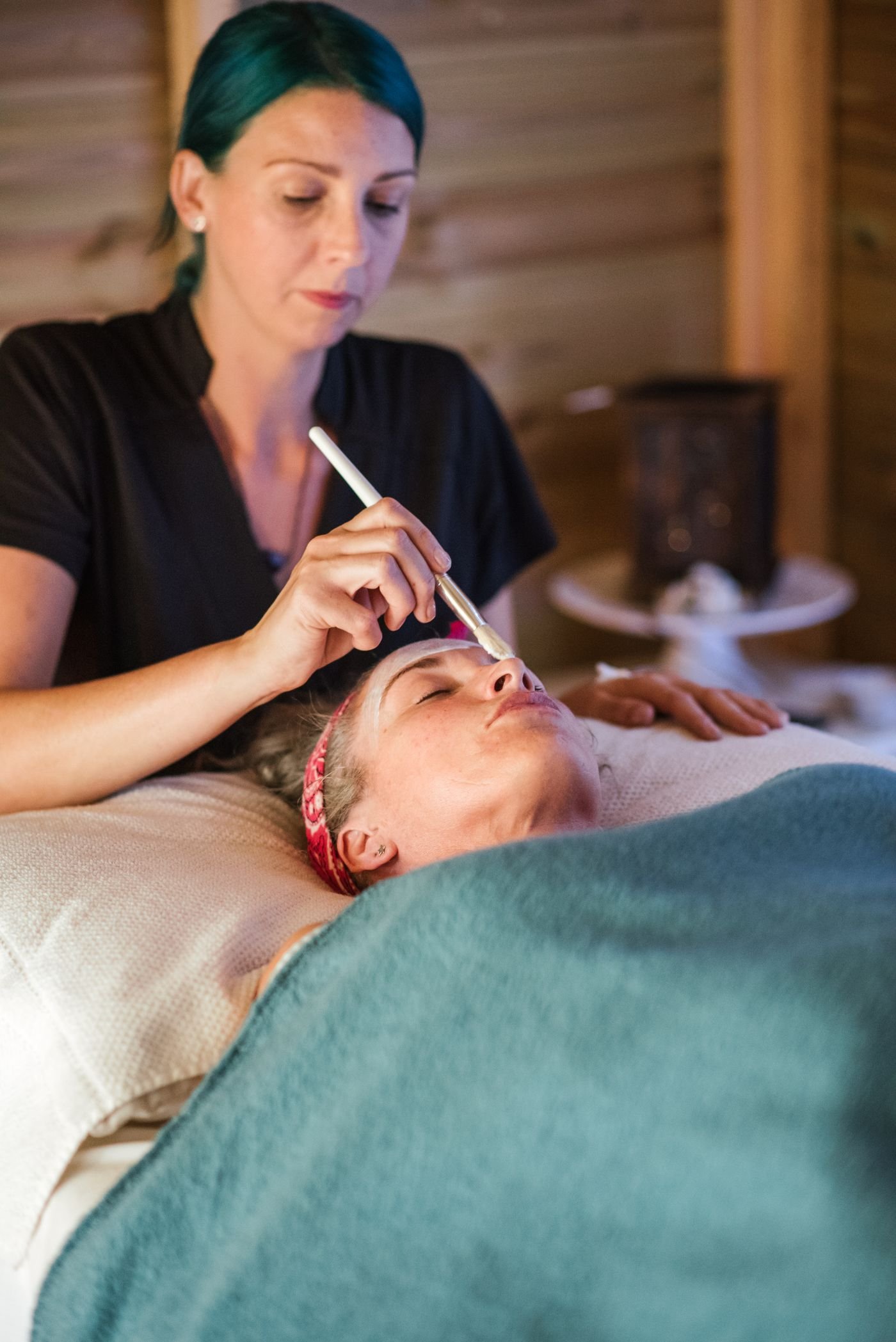 Stock photo of an esthetician applying a facial treatment